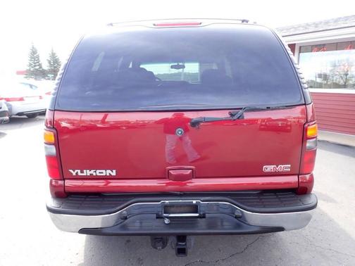 Red 2002 GMC Yukon SLE