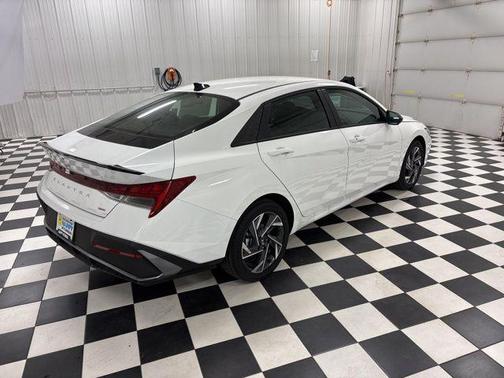 Serenity White 2025 Hyundai ELANTRA HEV SEL Sport