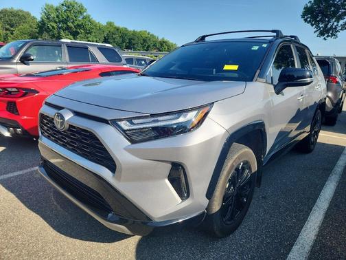 Silver Sky Metallic/Midnight Black Metallic 2023 Toyota RAV4 Hybrid SE