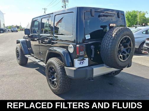 Black Clearcoat 2013 Jeep Wrangler Unlimited Sahara