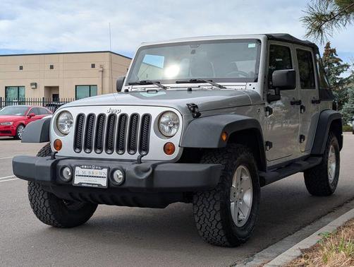 Bright Silver Metallic Clearcoat 2011 Jeep Wrangler Unlimited Sport