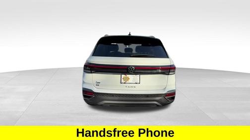 White 2026 Volkswagen Taos SE Black