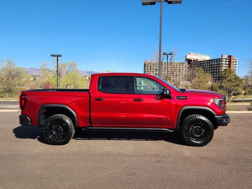 Volcanic Red 2026 GMC Sierra 1500 AT4X