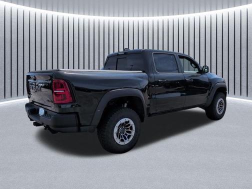 Diamond Black Crystal Pearlcoat 2026 RAM 1500 RHO Crew Cab 4x4 5'7' Box