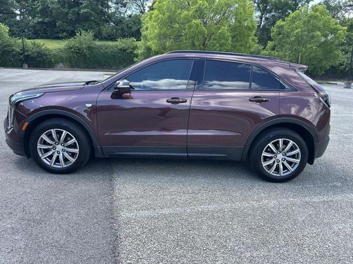 Rosewood Metallic 2023 Cadillac XT4 Sport