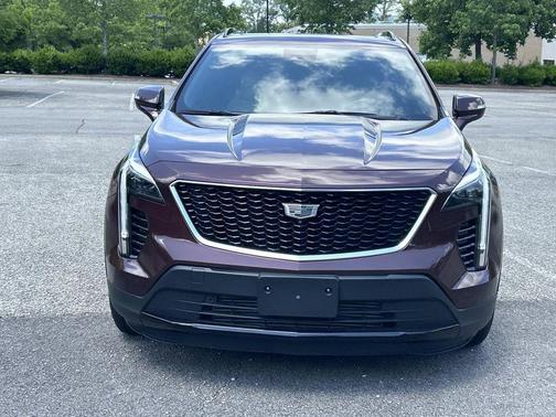 Rosewood Metallic 2023 Cadillac XT4 Sport