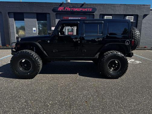 Black Clearcoat 2012 Jeep Wrangler Unlimited Sahara