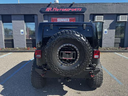 Black Clearcoat 2012 Jeep Wrangler Unlimited Sahara