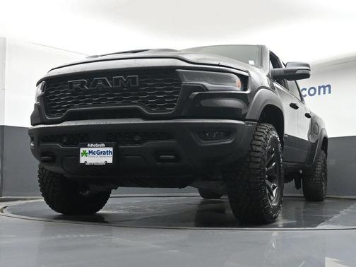 Diamond Black Crystal Pearlcoat 2026 RAM 1500 RHO Crew Cab 4x4 5'7' Box