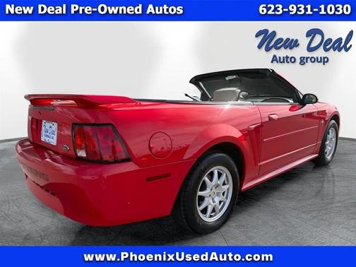 Red 2003 Ford Mustang Deluxe