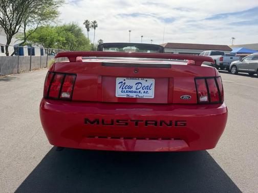 Red 2003 Ford Mustang Deluxe
