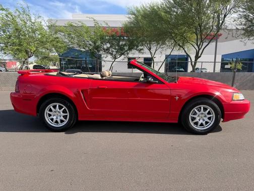 Red 2003 Ford Mustang Deluxe