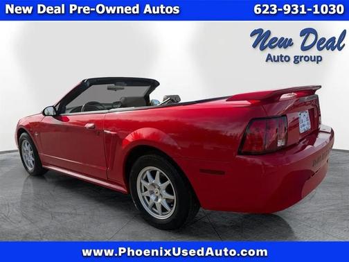 Red 2003 Ford Mustang Deluxe