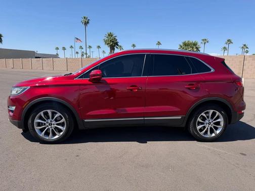 Red 2015 Lincoln MKC Base