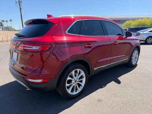 Red 2015 Lincoln MKC Base