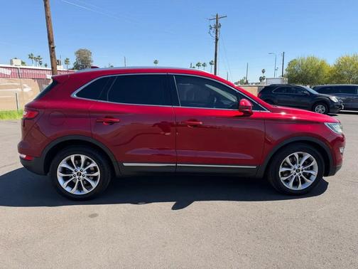 Red 2015 Lincoln MKC Base