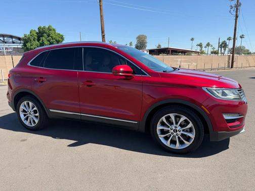 Red 2015 Lincoln MKC Base