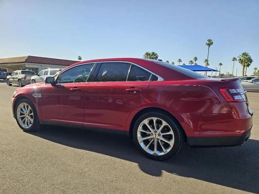 Red 2015 Ford Taurus Limited FWD