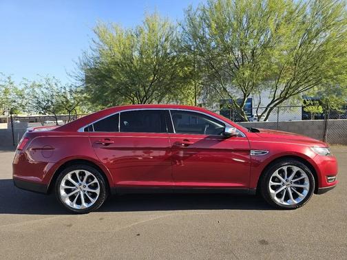 Red 2015 Ford Taurus Limited FWD