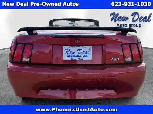 Red 2004 Ford Mustang Deluxe