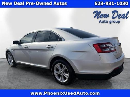 Red 2016 Ford Taurus SEL FWD