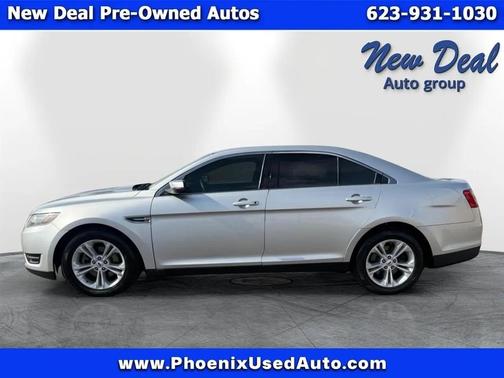 Red 2016 Ford Taurus SEL FWD