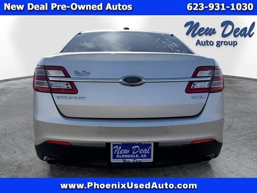 Red 2016 Ford Taurus SEL FWD