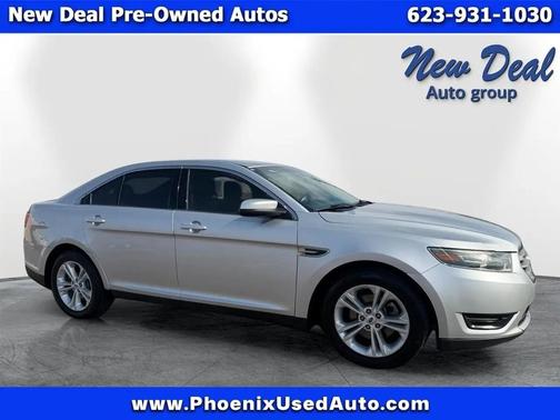 Red 2016 Ford Taurus SEL FWD