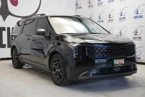 Black 2025 Kia Carnival SX