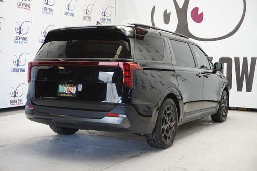 Black 2025 Kia Carnival SX
