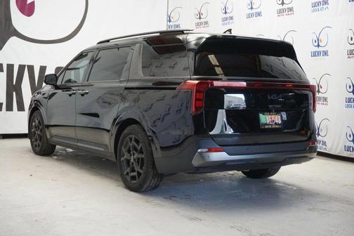 Black 2025 Kia Carnival SX