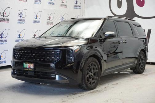 Black 2025 Kia Carnival SX