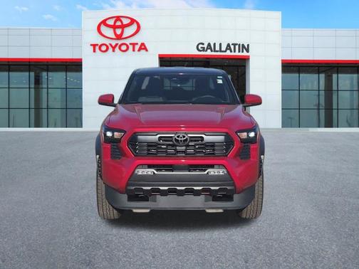 Red 2025 Toyota Tacoma Hybrid TRD