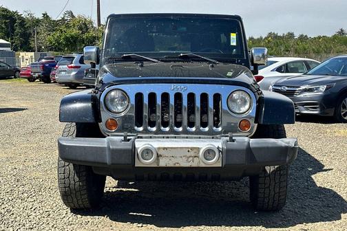 Black Clearcoat 2012 Jeep Wrangler Unlimited Sahara