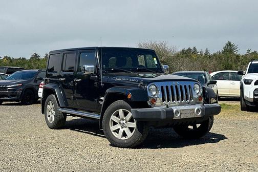 Black Clearcoat 2012 Jeep Wrangler Unlimited Sahara