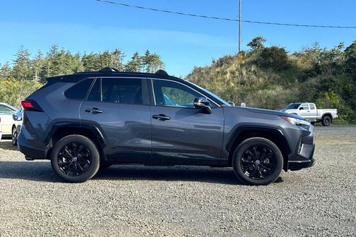 Silver Sky Metallic/Midnight Black Metallic 2023 Toyota RAV4 Hybrid SE