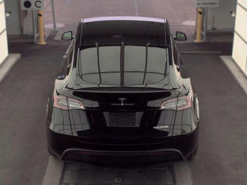 Solid Black 2025 Tesla Model Y Performance Dual Motor All-Wheel Drive