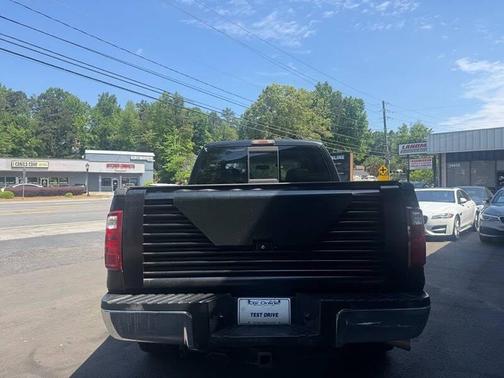 Black 2010 Ford F-250 XLT Super Duty Crew Cab