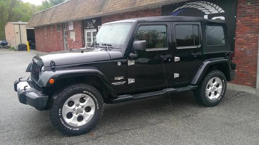 Black 2013 Jeep Wrangler Unlimited Sahara