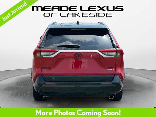 Supersonic Red/Midnight Black Metallic 2025 Toyota RAV4 Hybrid SE