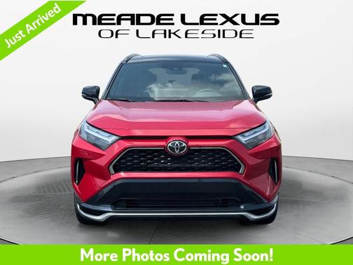 Supersonic Red/Midnight Black Metallic 2025 Toyota RAV4 Hybrid SE