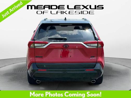 Supersonic Red/Midnight Black Metallic 2025 Toyota RAV4 Hybrid SE