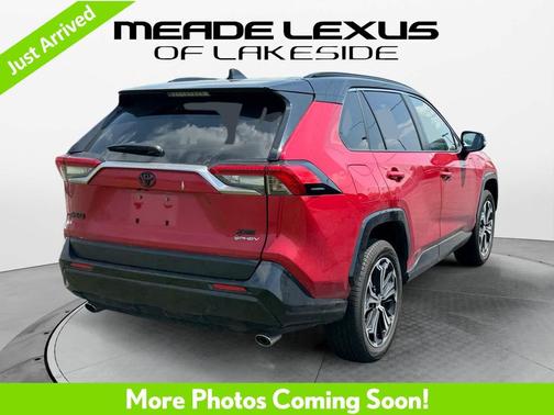 Supersonic Red/Midnight Black Metallic 2025 Toyota RAV4 Hybrid SE