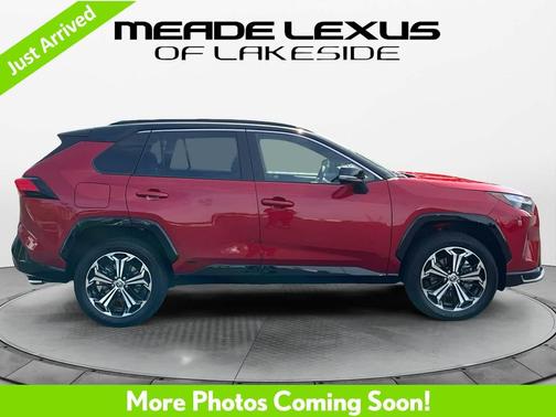 Supersonic Red/Midnight Black Metallic 2025 Toyota RAV4 Hybrid SE