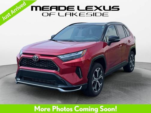 Supersonic Red/Midnight Black Metallic 2025 Toyota RAV4 Hybrid SE