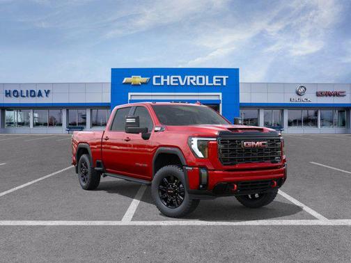 Volcanic Red Tintcoat 2026 GMC Sierra 3500 AT4