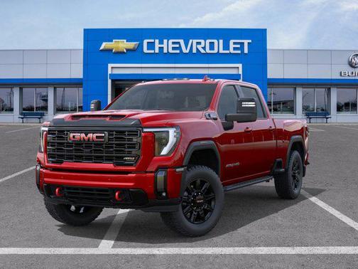 Volcanic Red Tintcoat 2026 GMC Sierra 3500 AT4