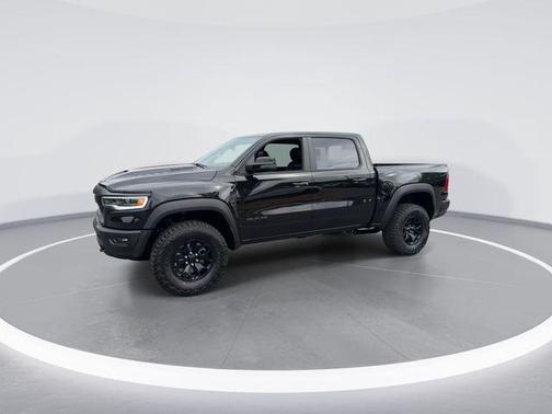 Diamond Black Crystal Pearlcoat 2026 RAM 1500 RHO Crew Cab 4x4 5'7' Box