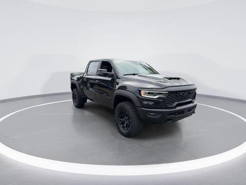 Diamond Black Crystal Pearlcoat 2026 RAM 1500 RHO Crew Cab 4x4 5'7' Box