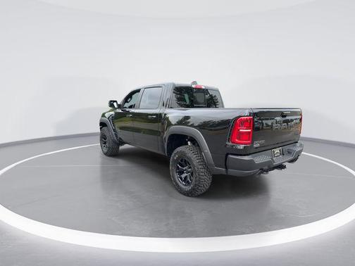 Diamond Black Crystal Pearlcoat 2026 RAM 1500 RHO Crew Cab 4x4 5'7' Box